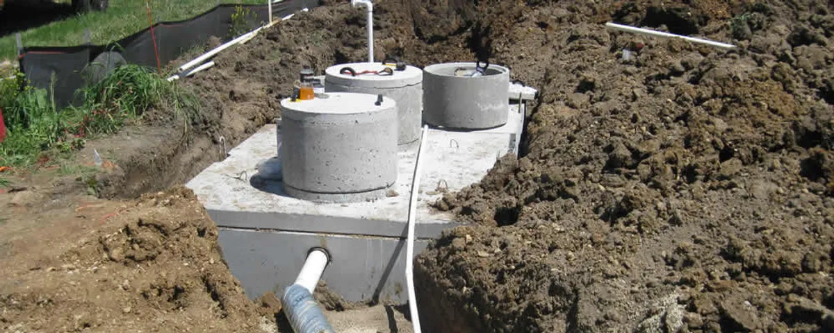 Septic system repair and installation site with tank access ports in Allentown, PA